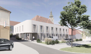 Zeitgenössisches Gebäude in Stadtzentrum mit Passanten und parkenden Autos vor historischer Kirche, veranschaulicht urbanes Leben.