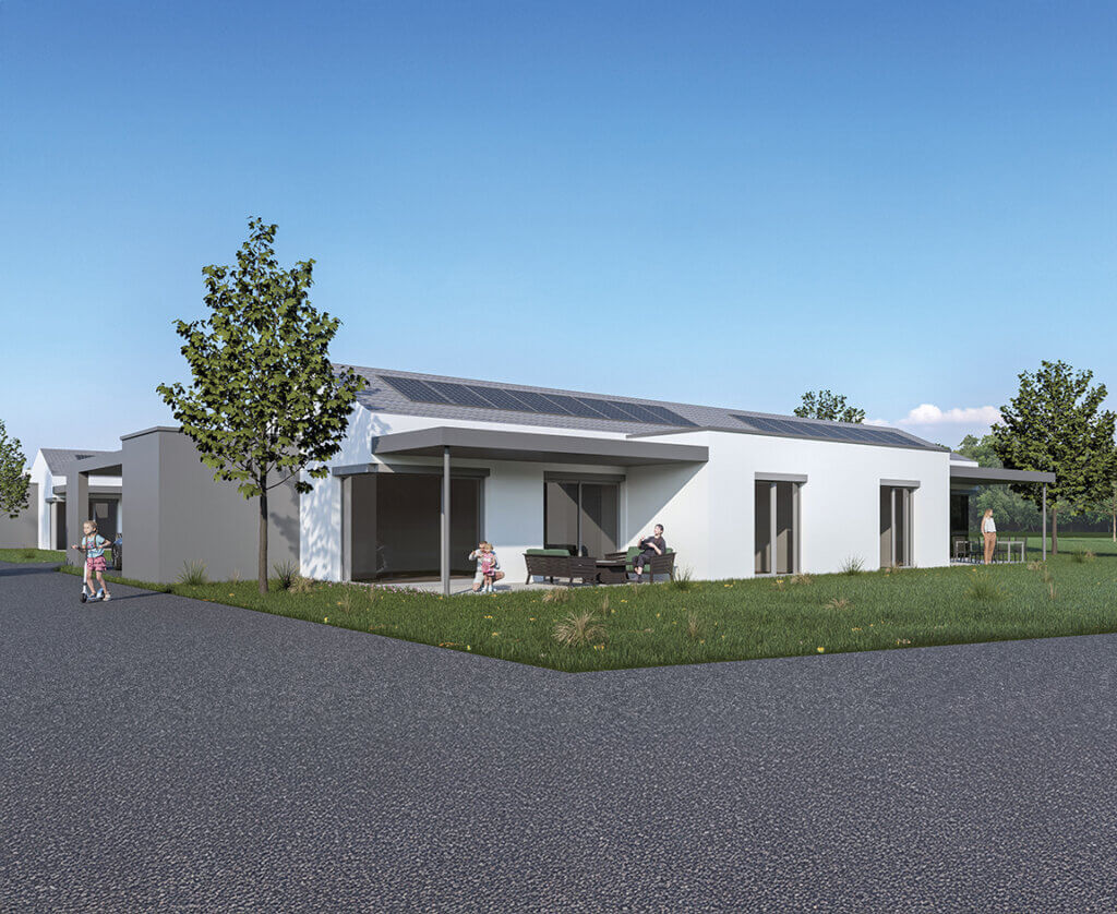 Moderne, nachhaltige Wohnsiedlung mit Solarpaneelen, umgeben von Grünflächen, Familien genießen den sonnigen Tag im Freien.