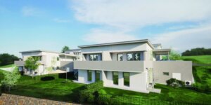 Moderne Doppelhäuser in grüner Umgebung bei Sonnenschein, passend zu einem Artikel über regionales Wohnen im Prima Magazin.